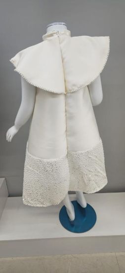 صورة فستان سهرة سكري بنهايات في الفساتن لماعه